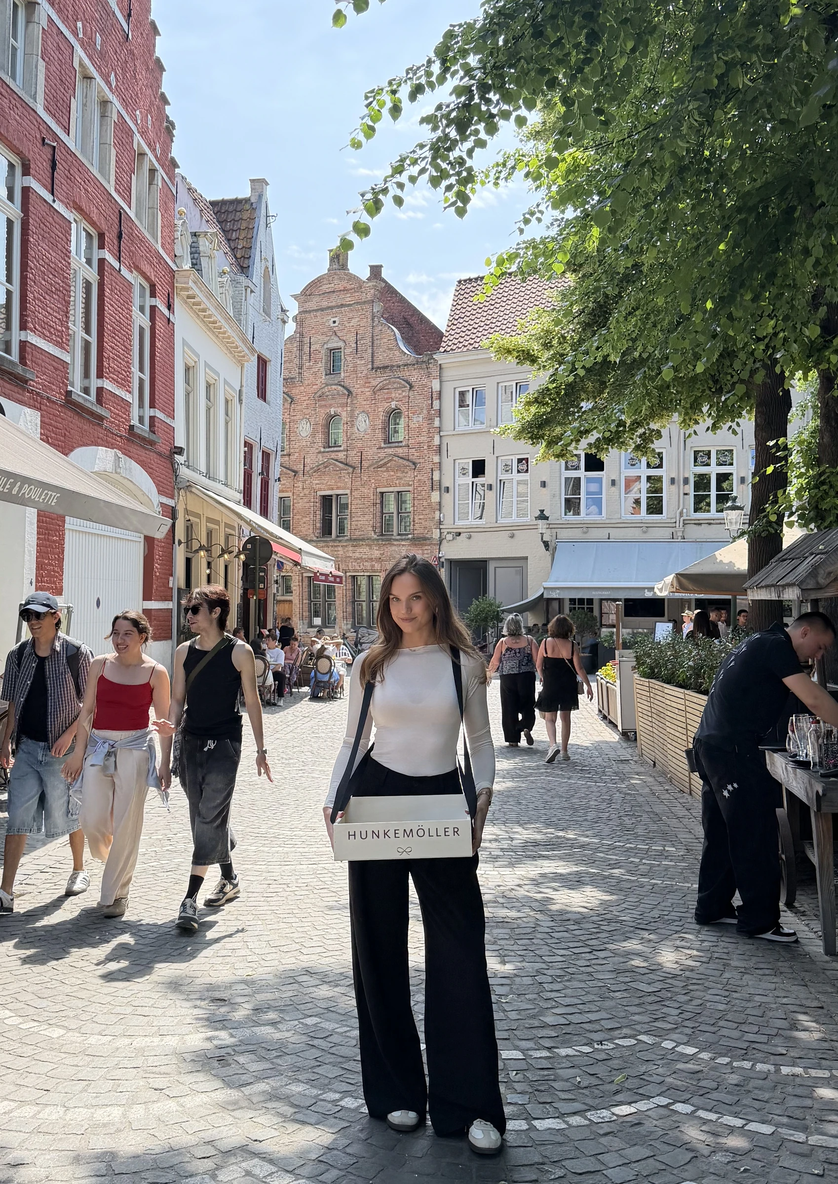 High Hospitality hostess carrying a Hunkemöller promotional tray during a city activation